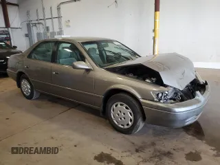 1997 Toyota Camry LE with VIN JT2BG22K8V0082736, listed as a Copart auction lot 58735955 with 54,699 mi miles and Salvage title. Bid and sale history available at DreamBid. Image 4.
