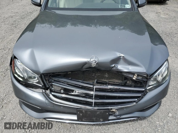 2018 Mercedes-Benz E 300 with VIN WDDZF4KBXJA337966, listed as a Copart auction lot 58718355 with 54,264 mi miles and Salvage title. Bid and sale history available at DreamBid. Image 11.