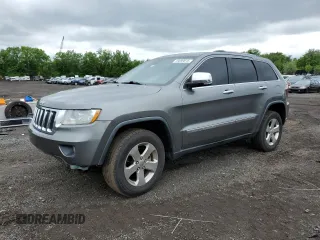 2012 Jeep Grand Cherokee Limited z VIN 1C4RJFBG3CC261336, wystawiony jako Copart lot #59099615 z przebiegiem 218 492 mil mil oraz Szkoda całkowita • Salvage title. Historia ofert i sprzedaży dostępna na DreamBid. Obrazek 1.