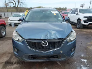 2014 Mazda CX-5 Grand Touring with VIN JM3KE4DYXE0403192, listed as a IAAI auction lot 41828016 with 156,270 mi miles and . Bid and sale history available at carsss.com. Image 12.