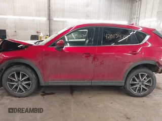 2018 Mazda CX-5 Grand Touring with VIN JM3KFBDM5J0414013, listed as a IAAI auction lot 42013479 with 88,225 mi miles and . Bid and sale history available at DreamBid. Image 15.