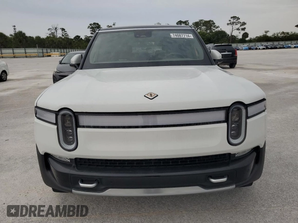 2023 Rivian R1S Adventure z VIN 7PDSGABA3PN024458, wystawiony jako Copart lot #74087714 z przebiegiem 3 505 mil mil oraz Nie do naprawy • Non repairable. Historia ofert i sprzedaży dostępna na DreamBid. Obrazek 5.