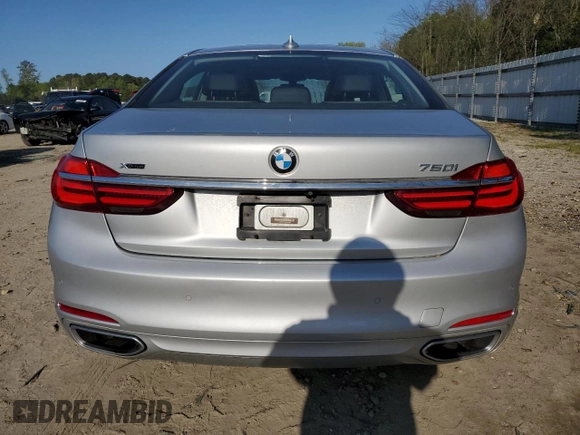 2016 BMW 7 Series 750i xDrive с VIN WBA7F2C58GG419163, выставлен на аукционе Copart как лот 52429835 с пробегом 93 025 миль миль и Списание • Salvage title. История ставок и продаж доступна на DreamBid. Изображение 6.