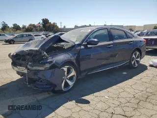 2020 Honda Accord Touring z VIN 1HGCV2F96LA008782, wystawiony jako Copart lot #53395065 z przebiegiem 35 044 mil mil oraz Szkoda całkowita • Salvage title. Historia ofert i sprzedaży dostępna na DreamBid. Obrazek 1.