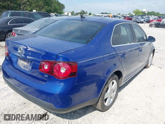 2009 Volkswagen Jetta SE z VIN 3VWRZ71K99M159242, wystawiony jako IAAI lot #42200917 z przebiegiem 226 285 mil mil oraz . Historia ofert i sprzedaży dostępna na DreamBid. Obrazek 4.