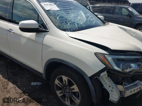 2019 Honda Ridgeline RTL-E with VIN 5FPYK3F71KB017906, listed as a IAAI auction lot 42670476 with 58,288 mi miles and . Bid and sale history available at DreamBid. Image 19.