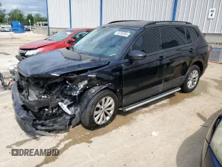 2018 Volkswagen Tiguan S with VIN 3VV0B7AX2JM105105, listed as a Copart auction lot 55282085 with 153,133 mi miles and Non repairable. Bid and sale history available at DreamBid. Image 1.