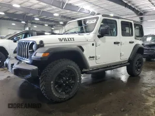2022 Jeep Wrangler Unlimited Willys with VIN 1C4HJXDM7NW244562, listed as a Copart auction lot 79667744 with 47,157 mi miles and Salvage Title. Bid and sale history available at DreamBid. Image 1.