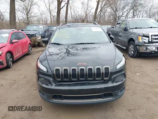 2016 Jeep Cherokee Latitude with VIN 1C4PJLCB1GW256777, listed as a IAAI auction lot 41150466 with 133,000 mi miles. Bid and sale history available at carsss.com. Image 12.