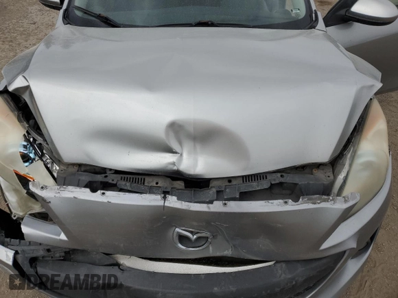 2012 Mazda 3 i Touring z VIN JM1BL1L74C1634540, wystawiony jako Copart lot #52929115 z przebiegiem 385 464 mil mil oraz Szkoda całkowita • Salvage title. Historia ofert i sprzedaży dostępna na DreamBid. Obrazek 11.