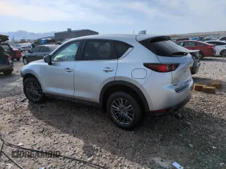 2020 Mazda CX-5 Touring with VIN JM3KFBCMXL0767254, listed as a Copart auction lot 52189335 with 96,922 mi miles and Salvage Title. Bid and sale history available at carsss.com. Image 2.