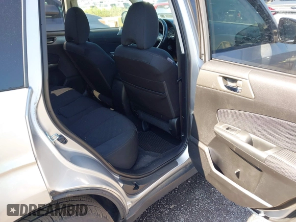 2012 Subaru Forester X Premium z VIN JF2SHADC8CH424853, wystawiony jako IAAI lot #42540390 z przebiegiem 217 063 mil mil oraz . Historia ofert i sprzedaży dostępna na DreamBid. Obrazek 8.