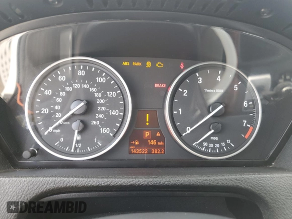 2012 BMW X5 35i with VIN 5UXZV4C54CL763857, listed as a Copart auction lot 57943195 with 143,522 mi miles and Salvage title. Bid and sale history available at DreamBid. Image 9.