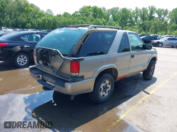 1999 Chevrolet Blazer LS с VIN 1GNCT18W3XK116060, выставлен на аукционе IAAI как лот 42213762 с пробегом 216 788 миль миль и . История ставок и продаж доступна на DreamBid. Изображение 4.