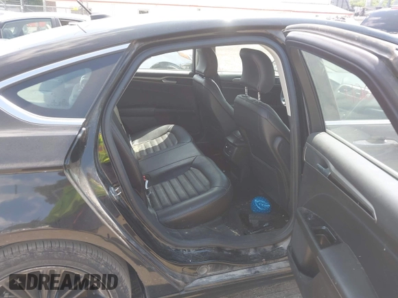 2016 Ford Fusion SE with VIN 3FA6P0HD8GR380945, listed as a IAAI auction lot 42626820 with 112,497 mi miles and . Bid and sale history available at DreamBid. Image 8.