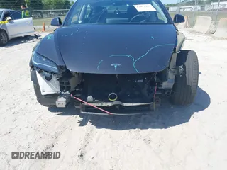 2024 Tesla Model 3 z VIN 5YJ3E1EA6RF747946, wystawiony jako IAAI lot #42042903 z przebiegiem 13 999 mil mil oraz . Historia ofert i sprzedaży dostępna na DreamBid. Obrazek 21.