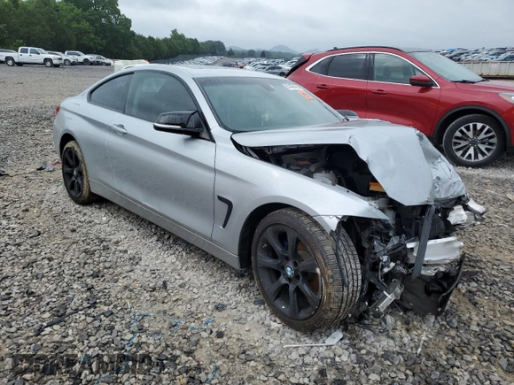 2015 BMW 4 Series 428i xDrive with VIN WBA3N5C59FK484702, listed as a Copart auction lot 61406785 with Not provided miles and Salvage title. Bid and sale history available at DreamBid. Image 4.