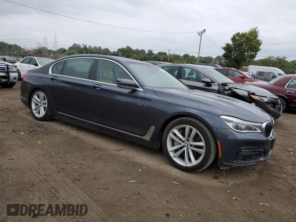 2016 BMW 7 Series 750i with VIN WBA7F0C54GGL99661, listed as a Copart auction lot 71742154 with 104,498 mi miles and Salvage Title. Bid and sale history available at carsss.com. Image 4.