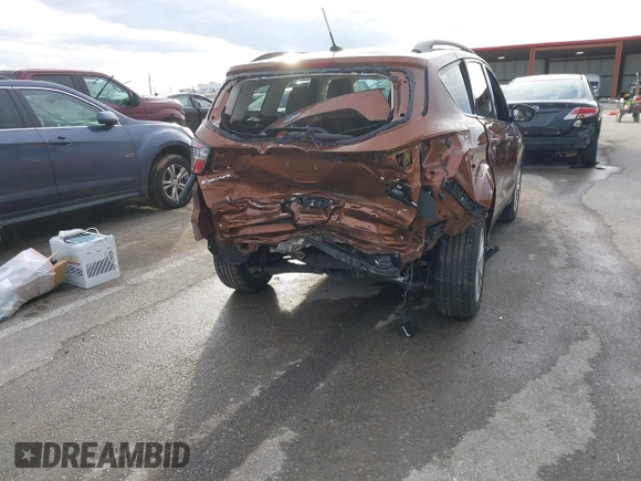 2017 Ford Escape SE with VIN 1FMCU0GD5HUE08097, listed as a IAAI auction lot 41499800 with 70,911 mi miles. Bid and sale history available at carsss.com. Image 17.