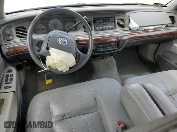 2004 Mercury Grand Marquis LS Premium z VIN 2MEFM75WX4X646351, wystawiony jako Copart lot #56770455 z przebiegiem 190 988 mil mil oraz Szkoda całkowita • Salvage title. Historia ofert i sprzedaży dostępna na DreamBid. Obrazek 8.
