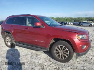 2014 Jeep Grand Cherokee Laredo with VIN 1C4RJEAG2EC475183, listed as a Copart auction lot 52422105 with 215,324 mi miles and Salvage Title. Bid and sale history available at carsss.com. Image 4.