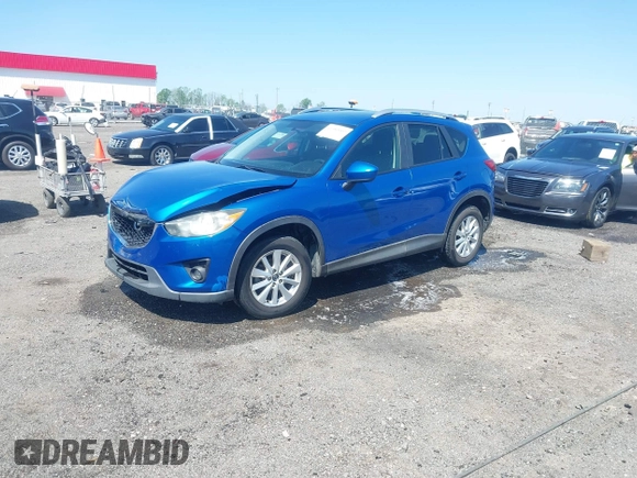 2013 Mazda CX-5 Touring with VIN JM3KE2CE4D0121155, listed as a IAAI auction lot 41983002 with 146,367 mi miles. Bid and sale history available at carsss.com. Image 2.