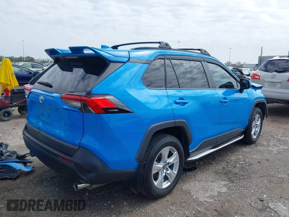 2021 Toyota RAV4 XLE with VIN 2T3W1RFV3MW164777, listed as a IAAI auction lot 41708032 with 76,854 mi miles. Bid and sale history available at carsss.com. Image 4.