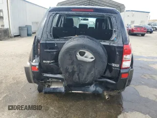 2007 Suzuki Grand Vitara with VIN JS3TE941474202110, listed as a Copart auction lot 52110865 with 132,661 mi miles and Salvage title. Bid and sale history available at DreamBid. Image 6.