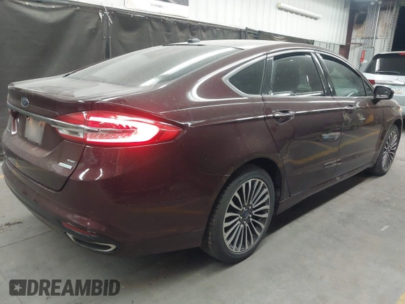 2017 Ford Fusion SE with VIN 3FA6P0H92HR105567, listed as a IAAI auction lot 42174324 with 123,443 mi miles and . Bid and sale history available at DreamBid. Image 4.