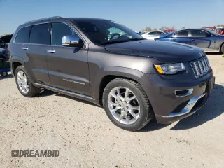 2014 Jeep Grand Cherokee Summit with VIN 1C4RJEJGXEC192532, listed as a Copart auction lot 86210124 with 72,401 mi miles and Salvage title. Bid and sale history available at DreamBid. Image 4.