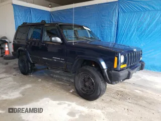 2001 Jeep Cherokee Sport with VIN 1J4FF48S81L620370, listed as a Copart auction lot 61663745 with 158,512 mi miles and Clean title. Bid and sale history available at DreamBid. Image 4.