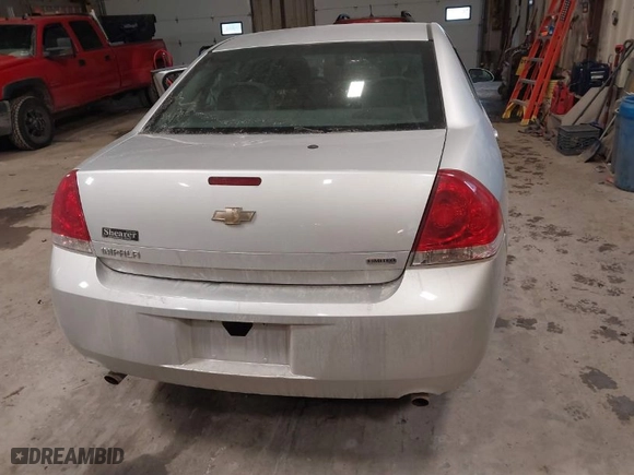 2014 Chevrolet Impala Limited LS with VIN 2G1WA5E36E1133664, listed as a IAAI auction lot 41409054 with NaN miles. Bid and sale history available at carsss.com. Image 16.