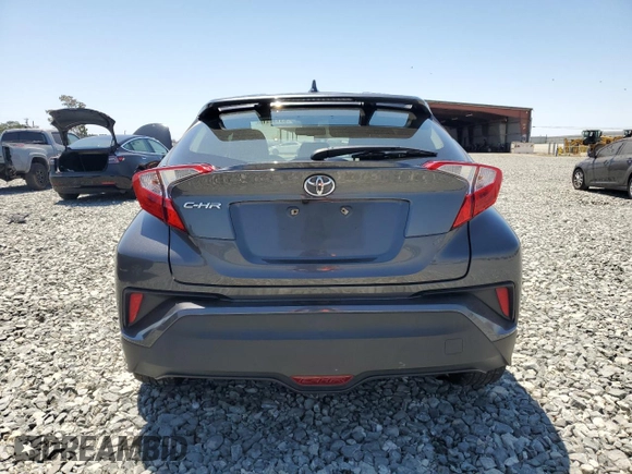 2018 Toyota C-HR XLE with VIN NMTKHMBX3JR016192, listed as a Copart auction lot 63130115 with 92,844 mi miles and Salvage title. Bid and sale history available at DreamBid. Image 6.