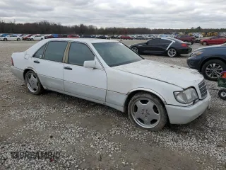 1992 Mercedes-Benz 560 with VIN WDBGA57E7NA068936, listed as a Copart auction lot 85746754 with 132,264 mi miles and Clean Title. Bid and sale history available at DreamBid. Image 4.