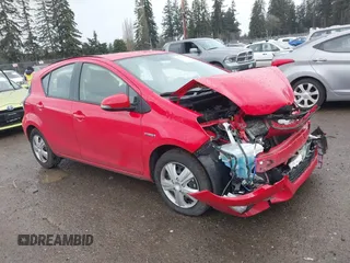 2016 Toyota Prius One z VIN JTDKDTB33G1118103, wystawiony jako IAAI lot #41604833 z przebiegiem 80 516 mil mil oraz . Historia ofert i sprzedaży dostępna na DreamBid. Obrazek 1.