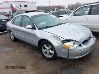 2003 Ford Taurus SE Standard with VIN 1FAFP53273G132268, listed as a IAAI auction lot 41790335 with 202,724 mi miles. Bid and sale history available at carsss.com. Image 1.