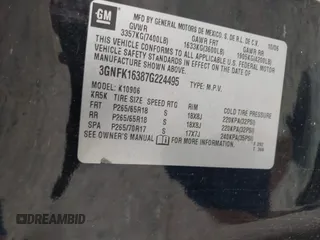 2007 Chevrolet Suburban LTZ z VIN 3GNFK16387G224495, wystawiony jako IAAI lot #42463438 z przebiegiem 190 297 mil mil oraz . Historia ofert i sprzedaży dostępna na DreamBid. Obrazek 9.