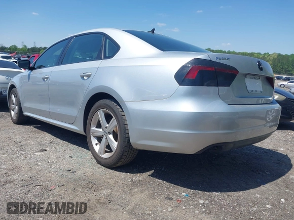 2014 Volkswagen Passat Wolfsburg Edition with VIN 1VWAT7A36EC045573, listed as a IAAI auction lot 41998740 with 151,633 mi miles and . Bid and sale history available at DreamBid. Image 3.