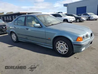 1998 BMW 3 Series 318i with VIN WBACC9322WEE60455, listed as a Copart auction lot 75950324 with 328,714 mi miles and Salvage Title. Bid and sale history available at carsss.com. Image 4.
