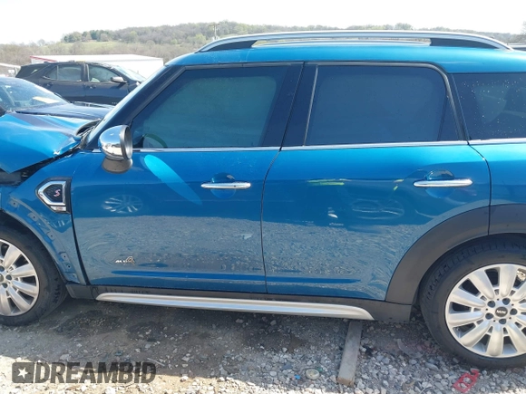 2018 MINI Countryman Cooper S with VIN WMZYT5C30J3E60548, listed as a IAAI auction lot 41890016 with 75,769 mi miles and . Bid and sale history available at DreamBid. Image 14.