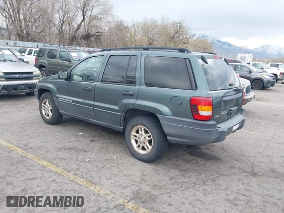 2003 Jeep Grand Cherokee Laredo with VIN 1J4GX48S03C536709, listed as a IAAI auction lot 41908946 with 240,435 mi miles. Bid and sale history available at carsss.com. Image 3.