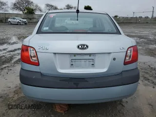 2009 Kia Rio LX with VIN KNADE223396443465, listed as a Copart auction lot 51370975 with 110,952 mi miles and Salvage Title. Bid and sale history available at carsss.com. Image 6.