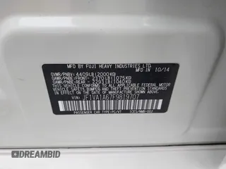 2015 Subaru WRX with VIN JF1VA1A67F9819707, listed as a IAAI auction lot 42021831 with 104,706 mi miles. Bid and sale history available at carsss.com. Image 9.