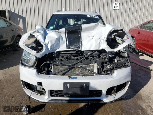 2020 MINI Countryman Cooper S with VIN WMZYX1C07L3L39910, listed as a Copart auction lot 76875464 with 65,876 mi miles and Non Repairable. Bid and sale history available at carsss.com. Image 5.