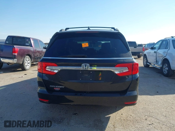 2018 Honda Odyssey EX-L z VIN 5FNRL6H74JB031306, wystawiony jako IAAI lot #41603478 z przebiegiem Nie podano mil oraz . Historia ofert i sprzedaży dostępna na DreamBid. Obrazek 16.