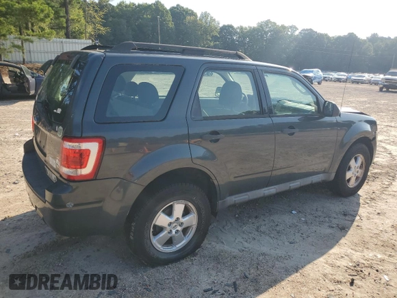 2009 Ford Escape XLS with VIN 1FMCU02739KD07929, listed as a Copart auction lot 64861745 with 144,914 mi miles and Clean title. Bid and sale history available at DreamBid. Image 3.