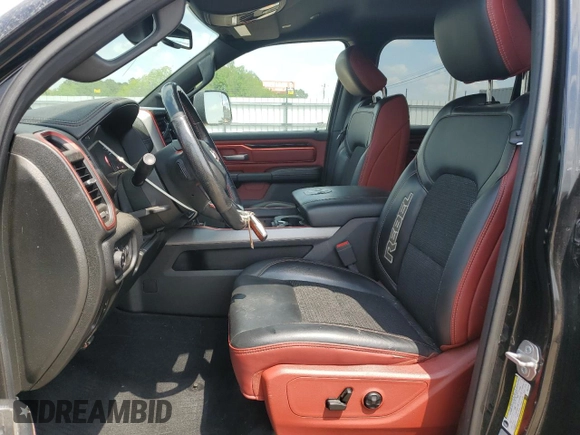 2019 Ram 1500 Rebel z VIN 1C6SRFLT8KN618140, wystawiony jako Copart lot #54734815 z przebiegiem 145 040 mil mil oraz Szkoda całkowita • Salvage title. Historia ofert i sprzedaży dostępna na DreamBid. Obrazek 7.