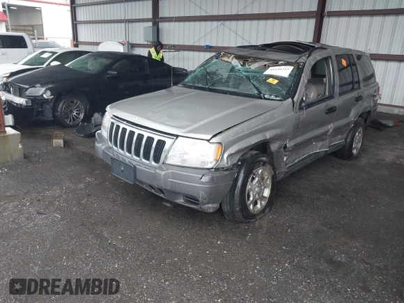 2001 Jeep Grand Cherokee Laredo with VIN 1J4GX48S51C708990, listed as a IAAI auction lot 41656323 with 198,124 mi miles and . Bid and sale history available at DreamBid. Image 2.