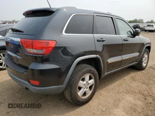 2011 Jeep Grand Cherokee Laredo with VIN 1J4RR4GGXBC567450, listed as a Copart auction lot 60056085 with 165,077 mi miles and Salvage title. Bid and sale history available at DreamBid. Image 3.