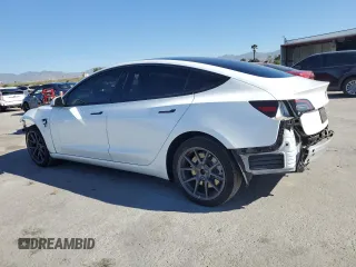 2022 Tesla Model 3 with VIN 5YJ3E1EA3NF125895, listed as a Copart auction lot 50042005 with 47,181 mi miles and Salvage Title. Bid and sale history available at DreamBid. Image 2.